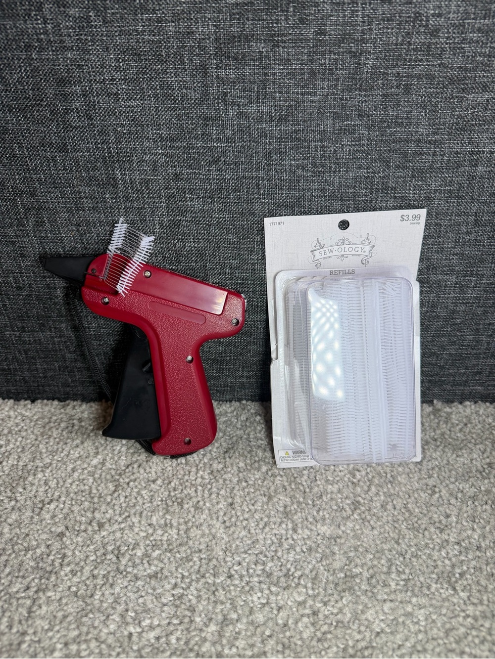 Burgundy Tagging Gun with Black Handle for Easy Price Labeling